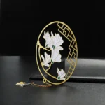 Pintura redonda de acero inoxidable grabado hueco plateado colgante de metal Marcapáginas