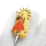 1606-4- Distintivo de ouro para menina e árvore