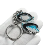 2336-1-Portachiavi irregolare con punto blu nichelato e verniciato