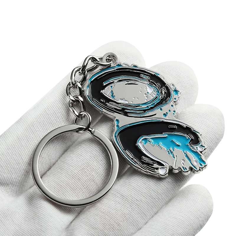 2336-1-Portachiavi irregolare con punto blu nichelato e verniciato