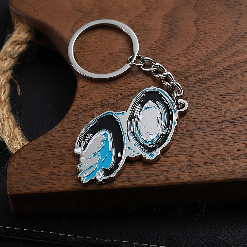 2336-5-Portachiavi irregolare con punto blu nichelato e verniciato