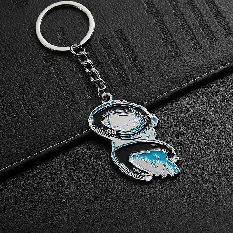 2336-7-Portachiavi irregolare con punto blu nichelato e verniciato