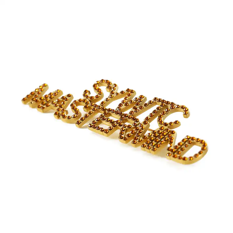 1665-1-Goldene, ausgehöhlte und mit Diamanten besetzte Brosche