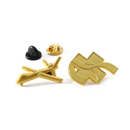 1922-1-A golden pin in the shape of an airplane