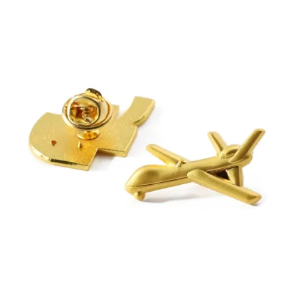 1922-3-A golden pin in the shape of an airplane