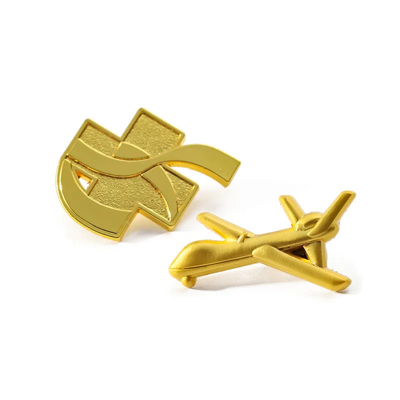 1922-4-A golden pin in the shape of an airplane